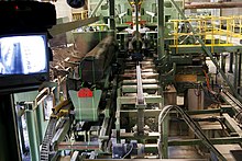 Laser guided cutting of wood inside modern woodmill
